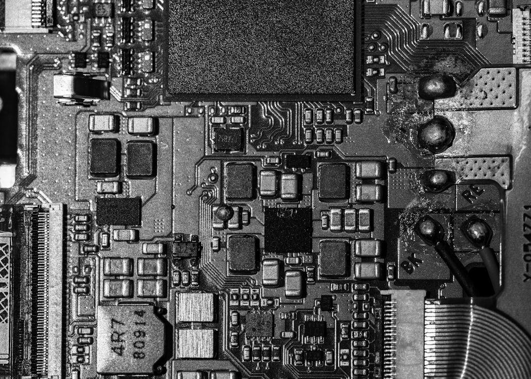 Satellite and cellular towers enabling global IoT connectivity | Photo by Albert Stoynov on Unsplash